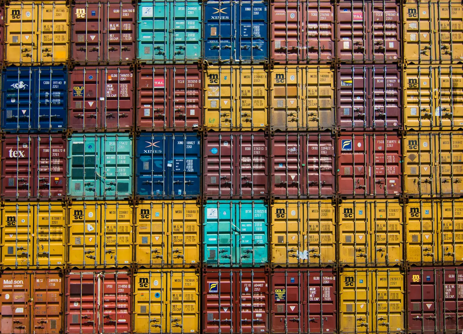 Stacked shipping containers in a container yard